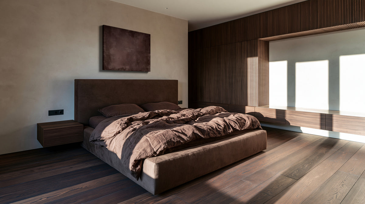 A House of Grace canvas above the bed in a bedroom with walnut joinery