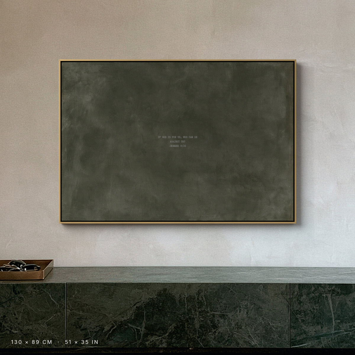Army Green canvas, 130 × 89 cm, gold floating frame, above a green marble sideboard in an Amsterdam penthouse
