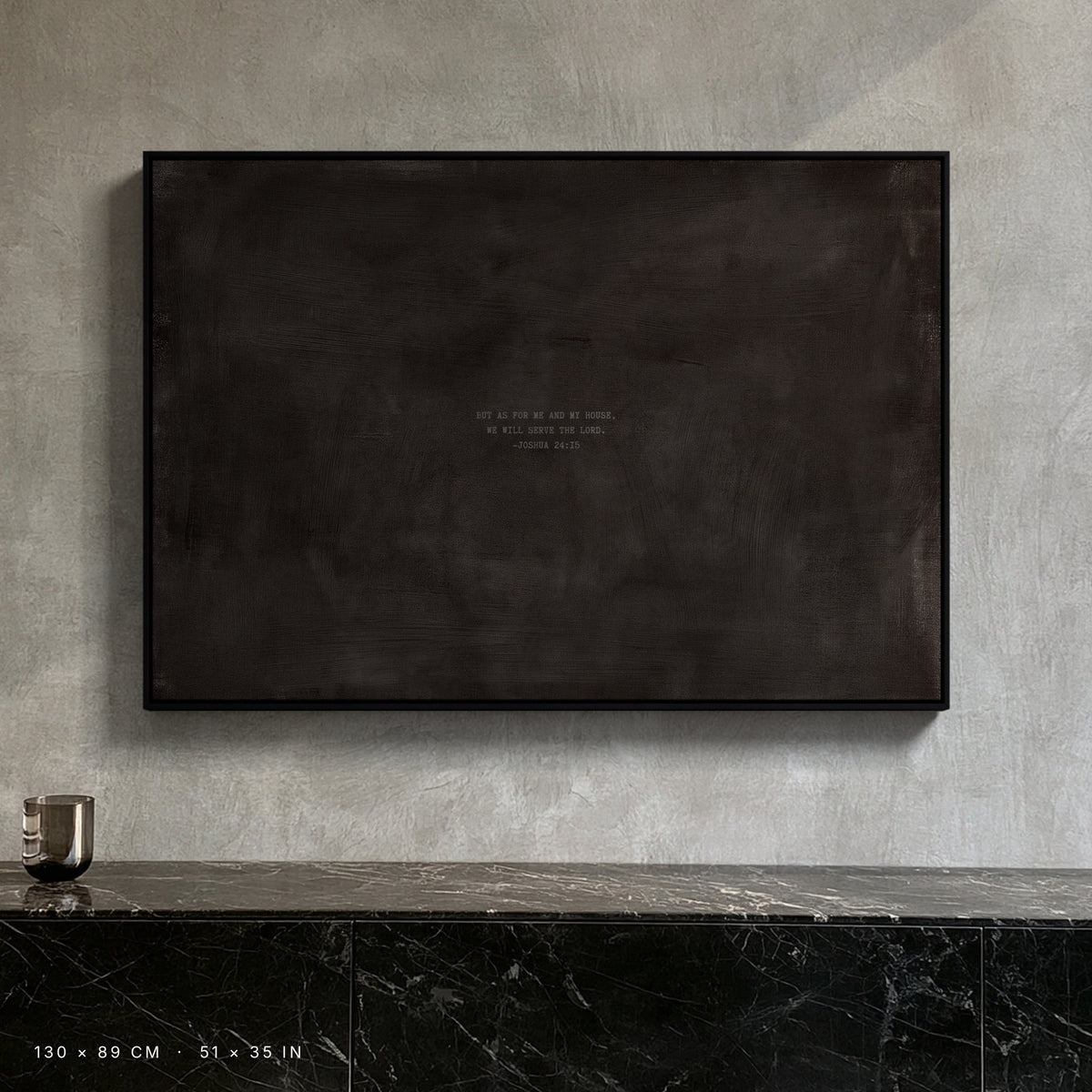 Charcoal canvas, 130 × 89 cm, black floating frame, above a black marble sideboard in a New York penthouse